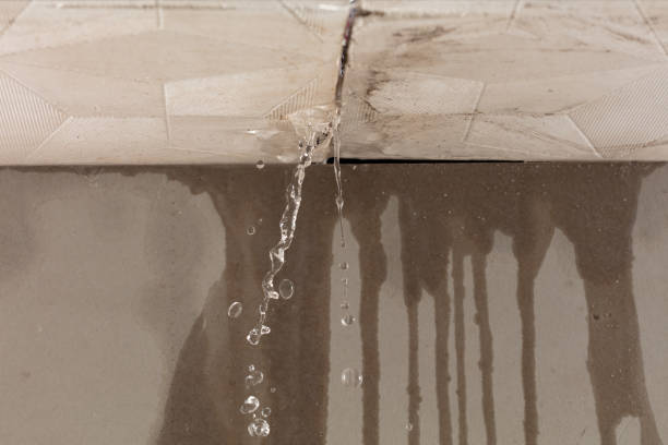 Professional Flood Damage Cleanup technician working in Bennington, NH